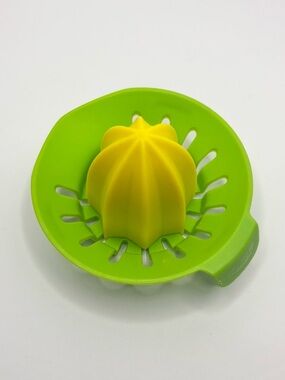Chef’n Juicster Mini Citrus Juicer Reamer in Bright Green and Yellow